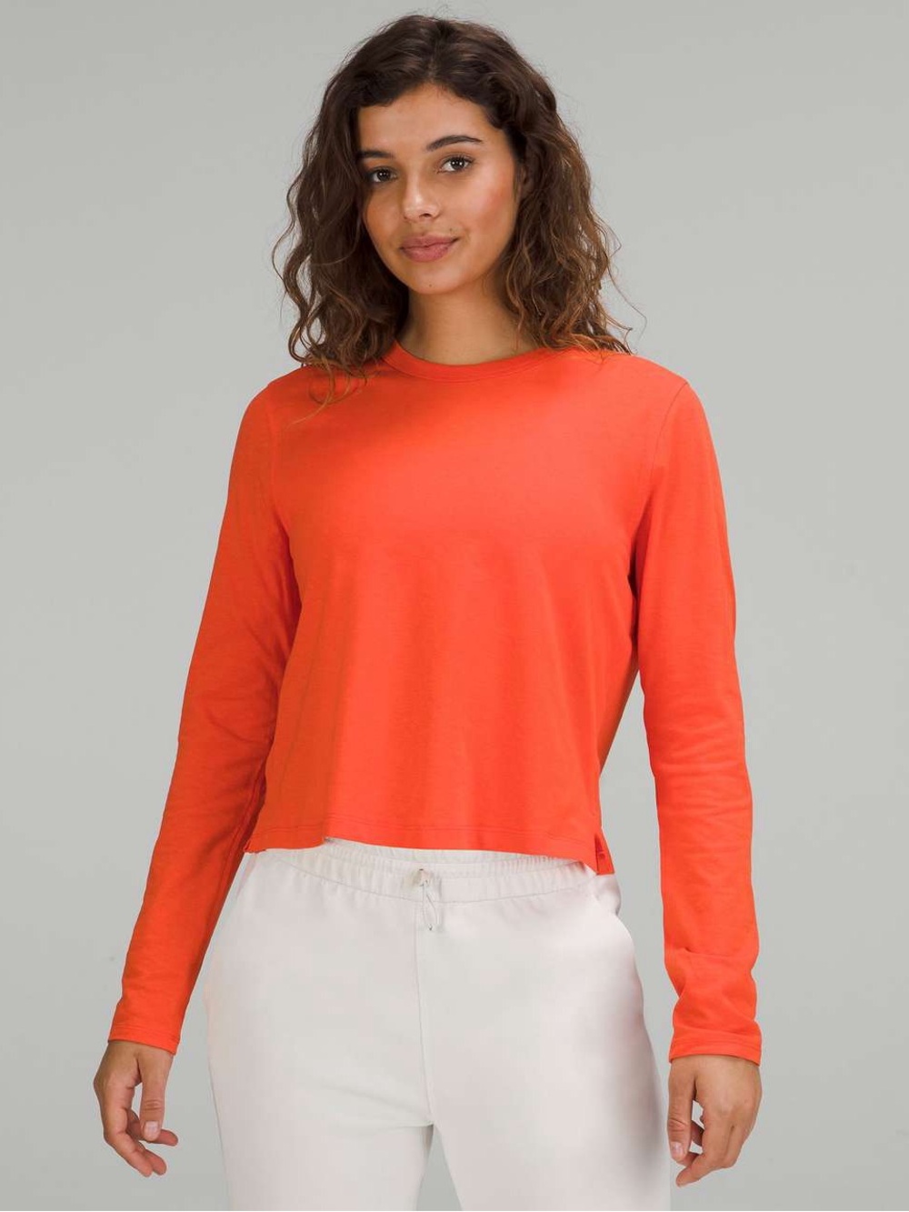 lululemon athletica Women's Long-Sleeve Crewneck Top in Bright Coral